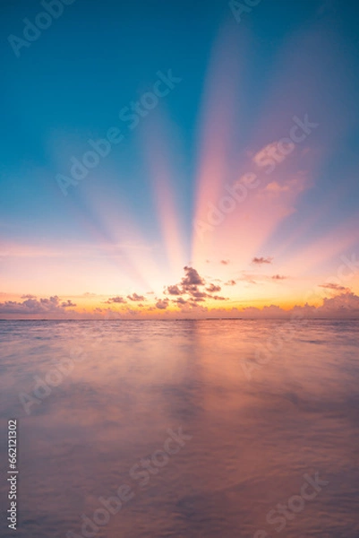 Fototapeta Dramatic colorful sunset sky over Mediterranean sea. Clouds sunrays. Cloudscape nature background. Panorama seascape, relaxing bright peaceful nature pattern. Majestic ocean view, calm water surface