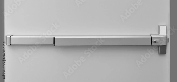 Obraz Emergency exit door. Push bar and rail for panic exit