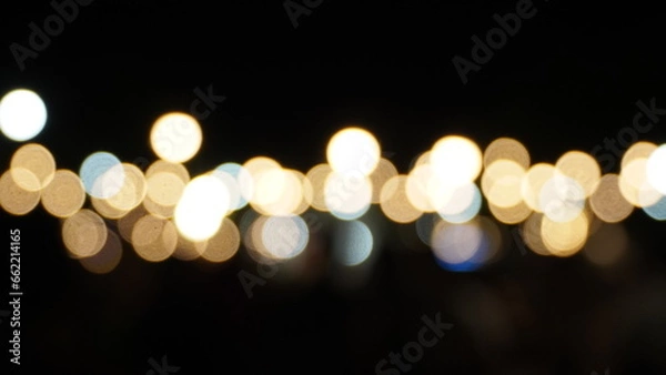 Fototapeta abstract background of blurred lights with bokeh effect