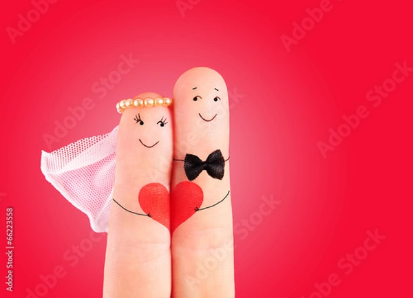 Fototapeta wedding concept, newlyweds with  heart against red background, p