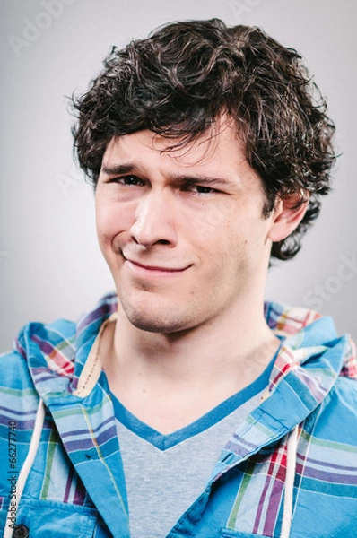 Obraz Young Caucasian man portrait with a doubtful expression