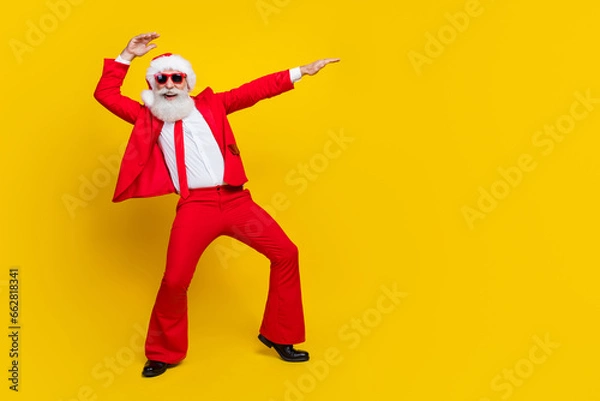 Fototapeta Full size portrait of overjoyed excited person dance make moves newyear event isolated on yellow color backgorund