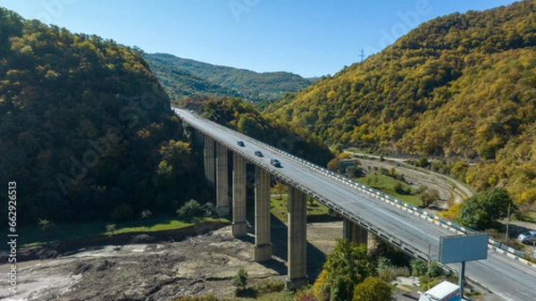Obraz bridge over the mountain river