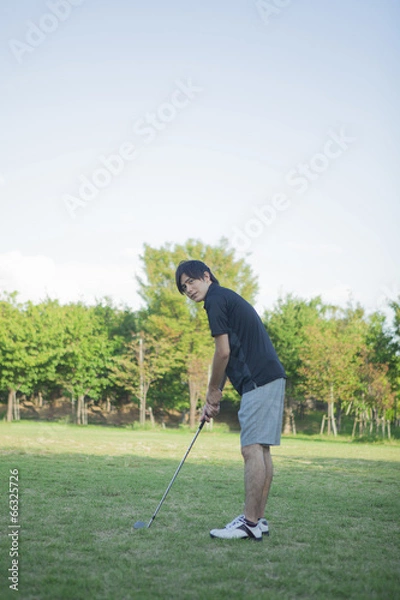 Fototapeta ゴルフをする男性