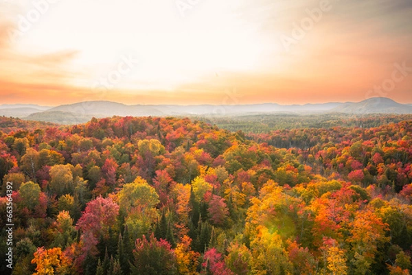 Fototapeta Aerial view of winding river in Laurentian mountains, Quebec, Canada during the fall