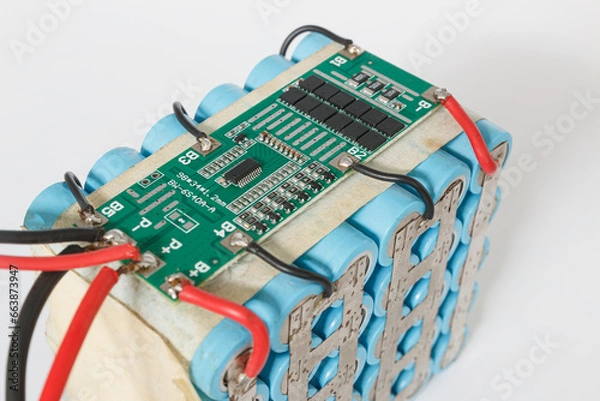 Fototapeta Packed lithium battery with bms available on white background.