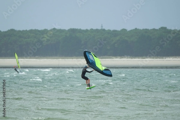 Obraz Direction la plage en wingfoil