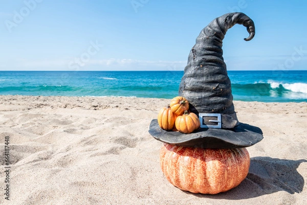 Obraz Halloween beach background with witch hat pumpkins