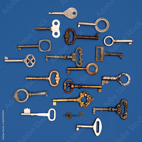 Fototapeta Top view photo of keys. Decorative, vintage, antique keys for clocks and caskets and doors with unique shapes and designs.