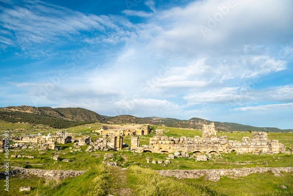 Obraz Ruins of Hierapolis ancient site in Pamukkale, Turkey. Hierapolis was an ancient Greek city located on hot springs in classical Phrygia in southwestern Anatolia.