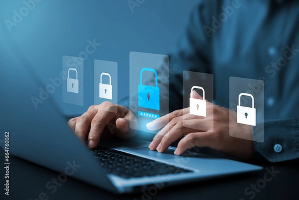 Fototapeta Cybersecurity and data protection, businessman using laptop internet network security, protect business and financial transaction data from cyber attack, user private data security encryption.