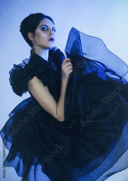 Fototapeta Cosplay girl in Wednesday Adams black dress