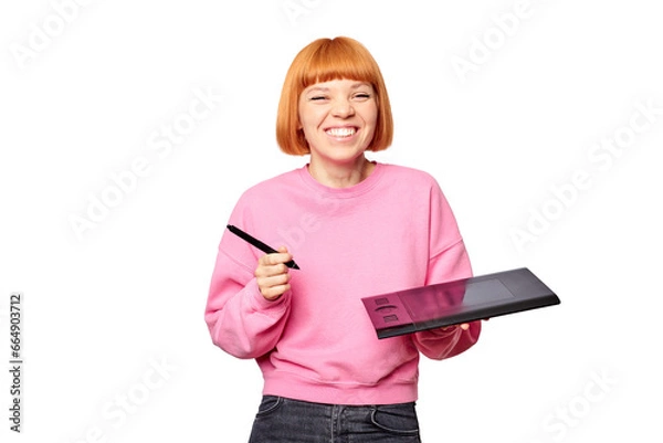 Obraz A smiling female designer in a pink sweet shot holding a graphic tablet.