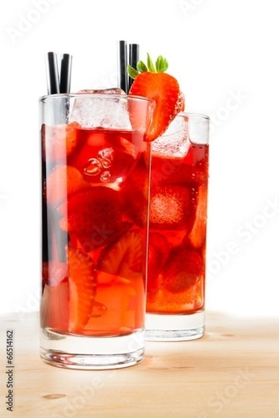 Fototapeta glasses of strawberry cocktail with ice on light wood table