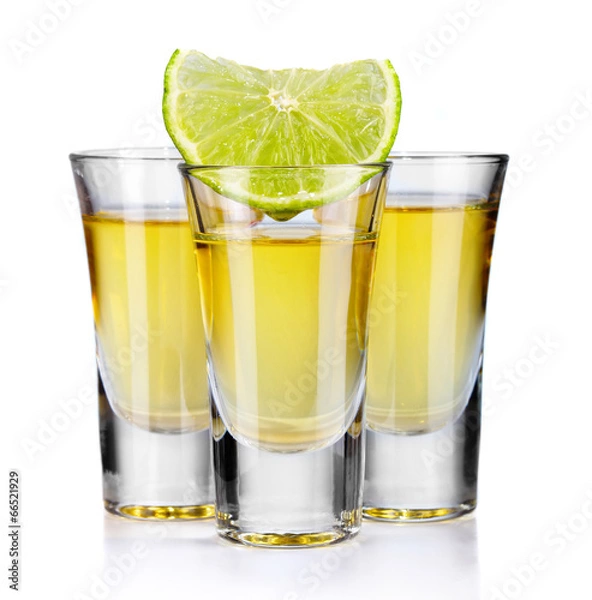 Obraz Three gold tequila shots with lime isolated on white