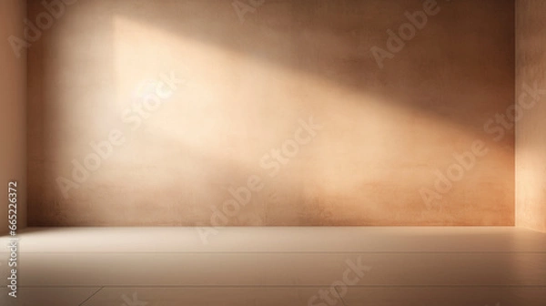Fototapeta Interior of a earthy pastel painted empty room, with soft warm light coming in from a window, abstract background with room for copy. 