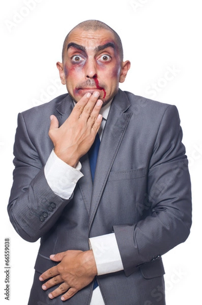 Obraz Badly beaten businessman isolated on white