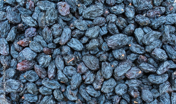 Obraz Dried Black raisins close-up view 