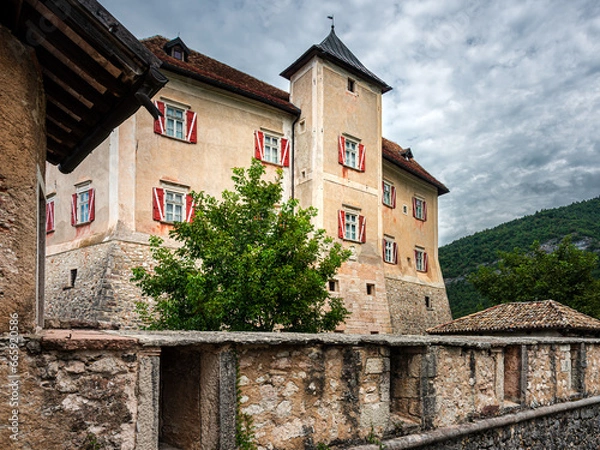 Fototapeta View of the main palace of CastleThun. 
Val di Non, August 2022: view of the facade of castle thun in val di non (closed to trento). italy