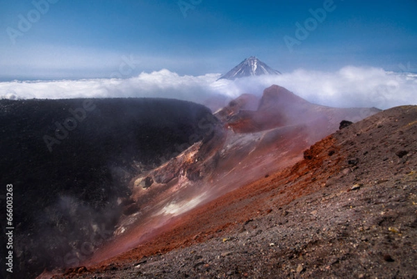Obraz Kamchatka volcanic landscape: view to top of cone of Koryaksky Volcano from scenery active crater of Avacha Volcano on sunny day and blue sky. Russian Far East