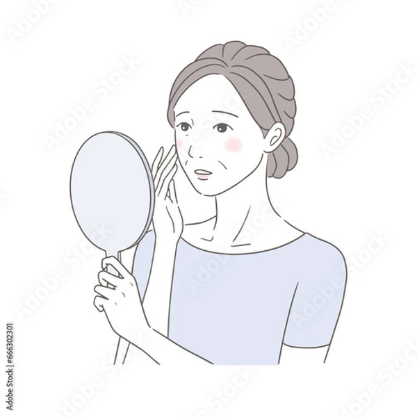 Fototapeta 手鏡を見るお肌の変化に戸惑うシニア女性