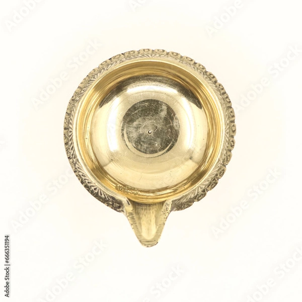 Fototapeta top view of diwali oil lamps used for light decorations during festivals and celebrations in hindu temple isolated in a white backgorund