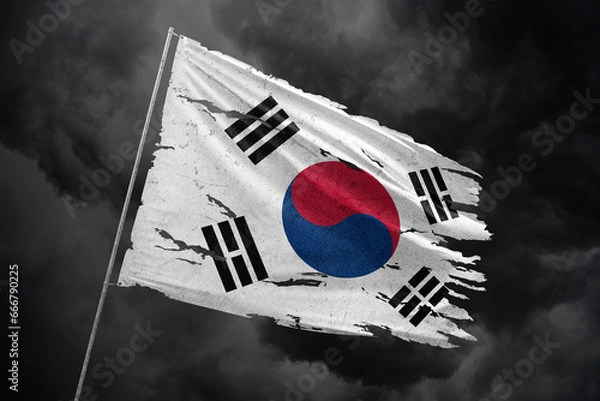Obraz South Korea torn flag on dark sky background.