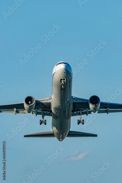 Fototapeta 離陸していく飛行機