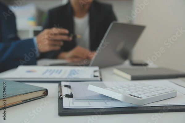 Fototapeta Team of business people are meeting to analyze data for marketing plan,Market research reports and income statistics, Financial and Accounting concept.