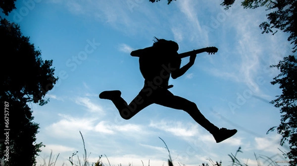 Fototapeta the guitarist that play and skip