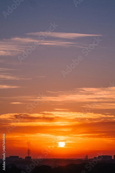 Obraz 朝焼けの太陽（縦構図）