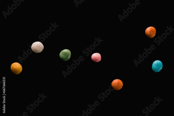 Obraz The Big Dipper constellation made of colored candies on a black background
