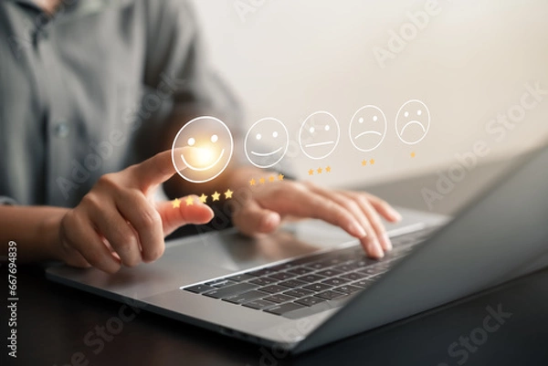 Fototapeta customer satisfaction survey concept businesswoman use laptop Touch the happy smiley icon. Satisfied. 5 stars. Service experience rating. online application Satisfaction Review best quality.