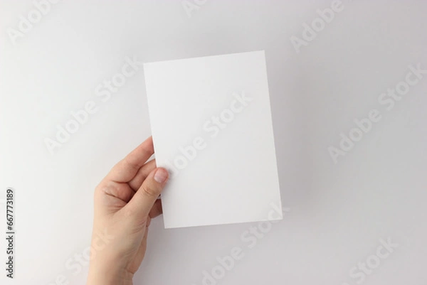 Fototapeta Card mockup in minimalist style, blank card in hand