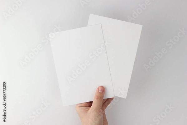Fototapeta Card mockup in minimalist style, two blank cards in hand
