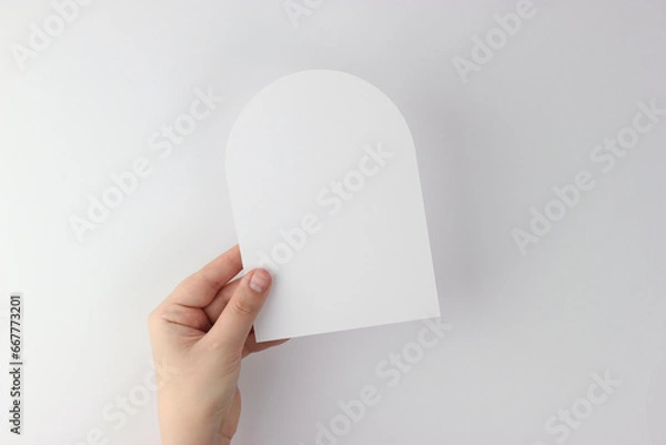Fototapeta Card mockup in minimalist style, blank card in hand, arch card mockup