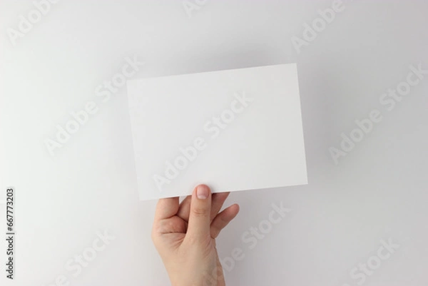 Fototapeta Card mockup in minimalist style, blank card in hand