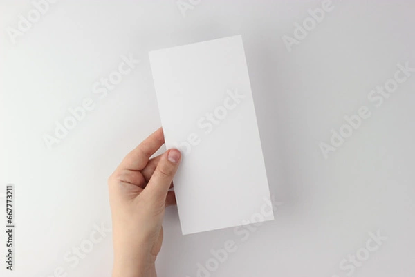 Fototapeta Card mockup in minimalist style, blank card in hand