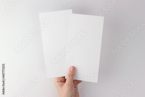 Fototapeta Card mockup in minimalist style, two blank cards in hand