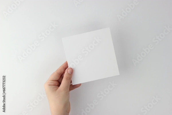Fototapeta Square Card mockup in minimalist style, blank card in hand