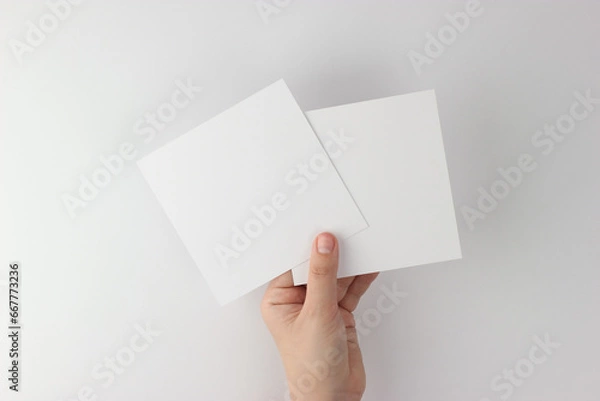 Fototapeta Square Card mockup in minimalist style, two blank cards in hand