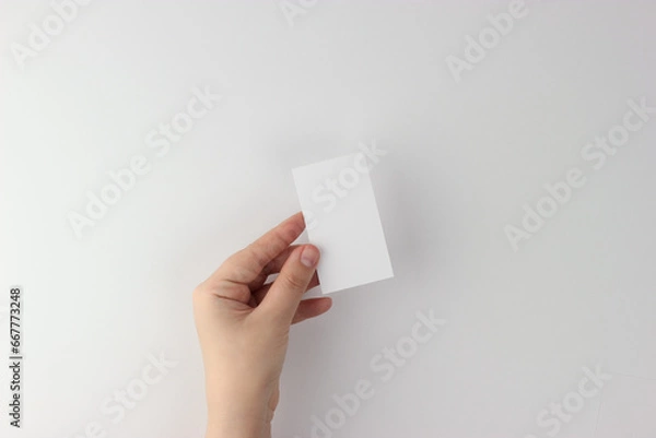 Fototapeta Business Card mockup in minimalist style, blank card in hand