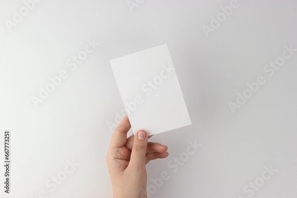 Fototapeta Card mockup in minimalist style, blank card in hand