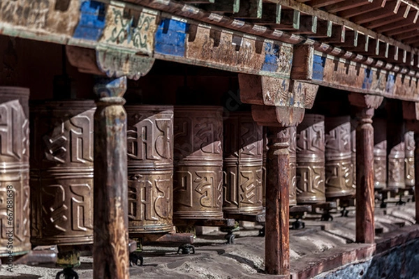 Obraz Tibetan prayer wheels at Sakya Monastery also known as Pel Sakya is a Buddhist monastery situated in Sa'gya Town - Tingri county, Tibet - China