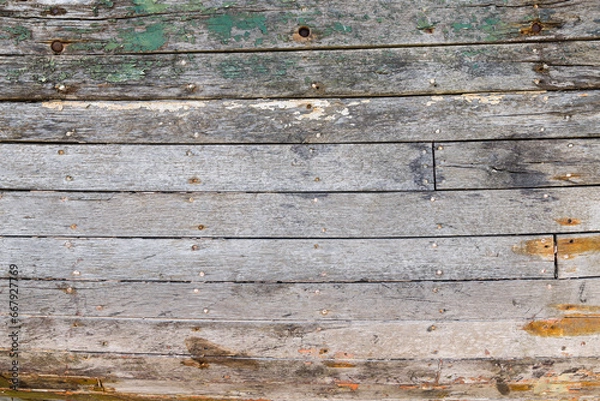 Obraz Background texture of weathered wooden boards of a shipwreck
