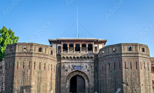 Obraz Historical , ancient, stone made monument named Shaniwar Wada in Pune. Text in local language is name" Shaniwar Wada".