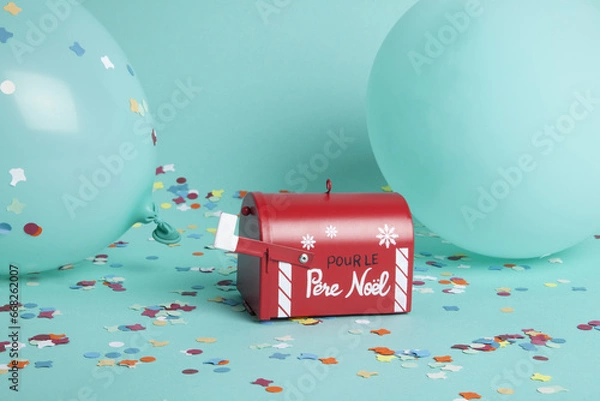 Obraz Santa's famous letterbox surrounded by confetti and balloons