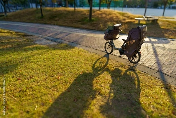 Obraz 夕暮れ時の公園で