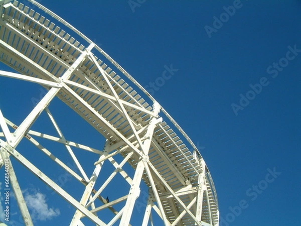 Fototapeta White rollercoaster in the sky