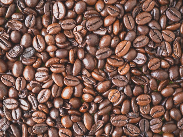 Fototapeta Roasted coffee beans forming a background pattern